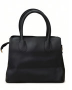Black handbag on a white background