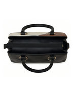 Black handbag with a white interior on a white background
