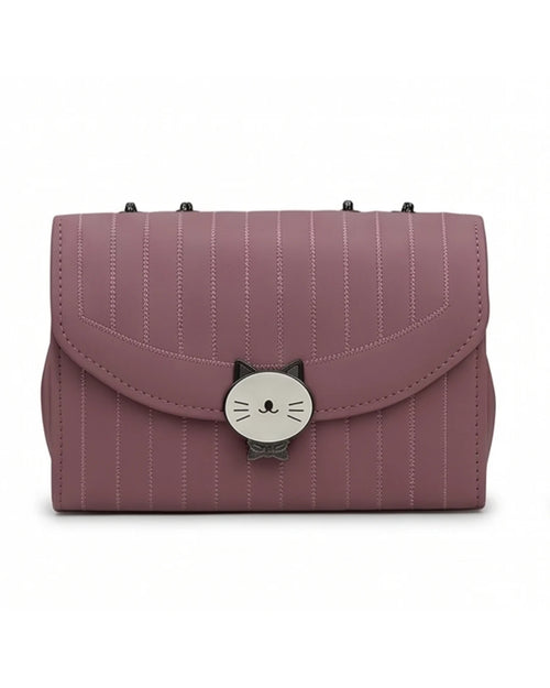 Pink striped handbag with a cat-shaped clasp on a white background