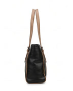 Black handbag with beige straps on a white background