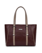 Brown handbag with beige straps on a white background