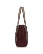 Brown leather handbag with a strap on a white background