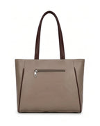 Beige handbag with a brown handle on a white background