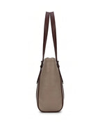 Brown handbag with a strap on a white background