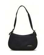Black handbag with a strap on a white background