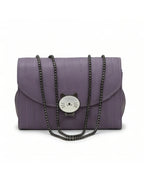 Purple handbag with a cat face emblem and chain strap on a white background