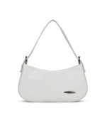 White handbag with a shoulder strap on a white background