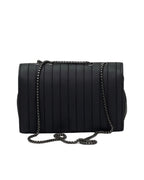 Black quilted handbag with chain strap on a white background