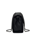 Black handbag with chain strap on a white background