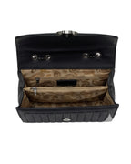 Black handbag with paisley pattern interior on a white background