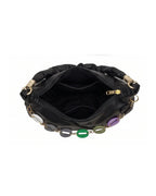 Black handbag with colorful accents on a white background