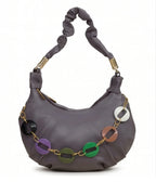 Gray handbag with colorful chain detail on a white background