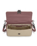 Open handbag with pink top section and beige bottom section on a white background