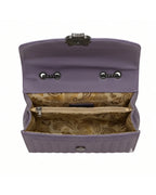 Purple handbag with paisley pattern interior on a white background