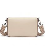 Beige crossbody bag with a zigzag strap on a white background