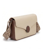 Beige handbag with brown accents on a white background