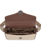 Open handbag with brown interior and beige exterior on a white background