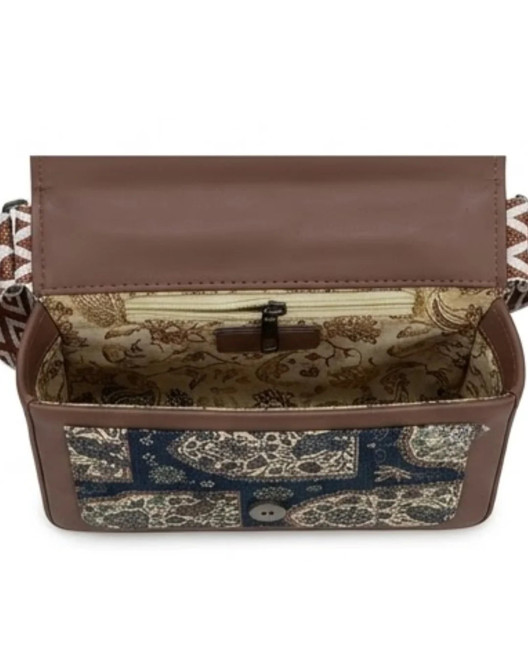 Patterned bag with a brown flap on a white background
