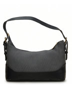 Gray and black handbag on a white background