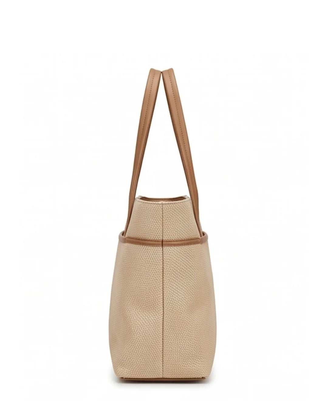 Beige woven handbag with brown leather straps on a white background