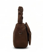 Brown leather shoulder bag on a white background