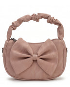 Pink handbag with a large bow and knotted handle on a white background