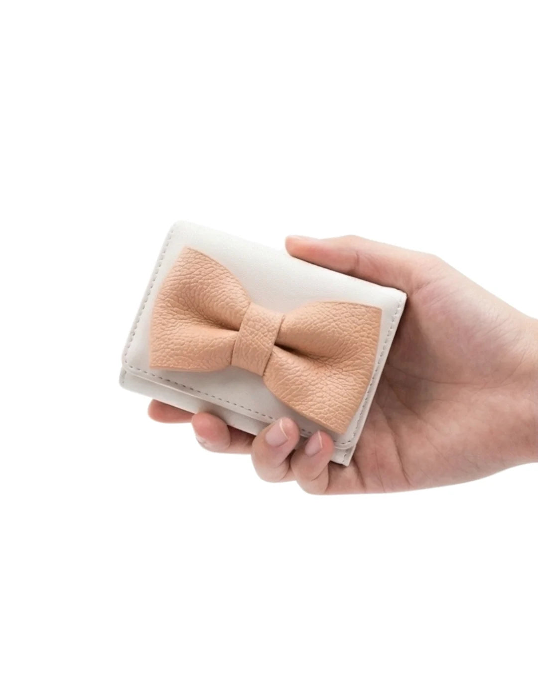 Peach oversized bow mini wallet by Lora Halle