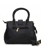 Black handbag with gold accents on a white background
