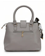 Gray handbag with a matching scarf on a white background