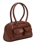 Brown leather handbag with two front pockets on a white background