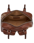 Brown leather bag with zippers on a white background
