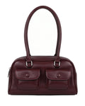 Maroon handbag with two front pockets on a white background