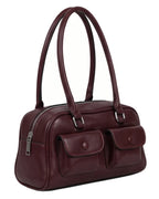Maroon handbag with two front pockets on a white background