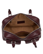 Brown leather backpack with open front compartment on a white background