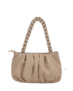 Beige handbag with braided handle on a white background