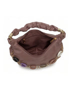 Brown handbag with decorative chain and embellishments on a white background